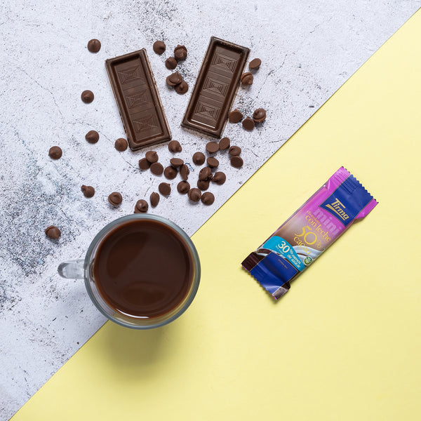 Tirma Mini 50% Milk Chocolate Bars, 30% Less Sugars 180 g with a cup of chocolate drink. Spanish mini milk chocolate bars made in Spain