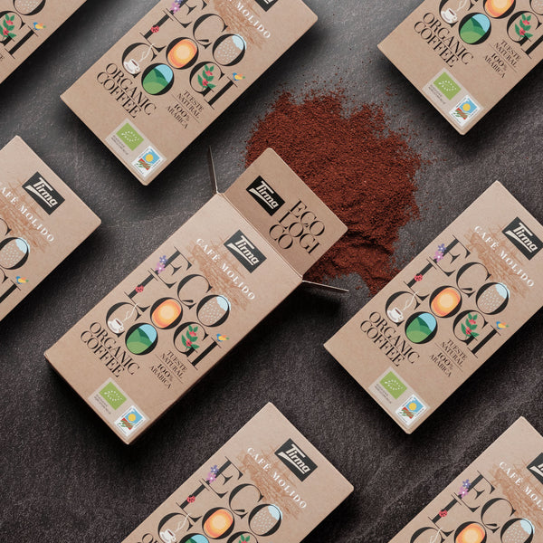 8 Tirma Organic Blend Coffee 250 g with a ground coffee on the center. Spanish coffee made in Spain.