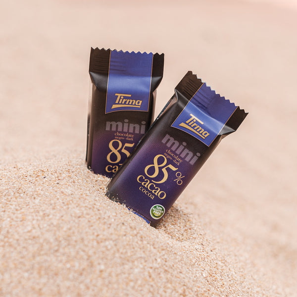 Tirma Mini 85% Dark Chocolate Bars 180 g. The 2 mini chocolate on the sand. Spanish mini dark chocolate made in Spain.