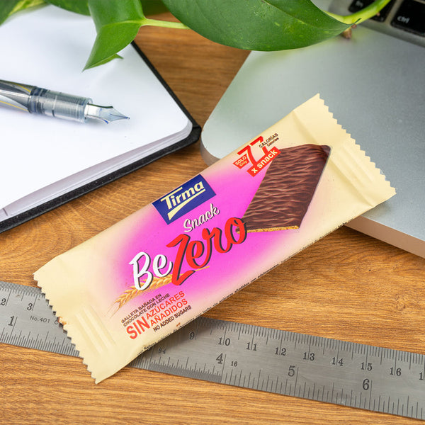 Tirma Snack BeZero Milk Chocolate Biscuit Bar leaning on computer - ideal snack whilst working. Spanish biscuit made in Spain.