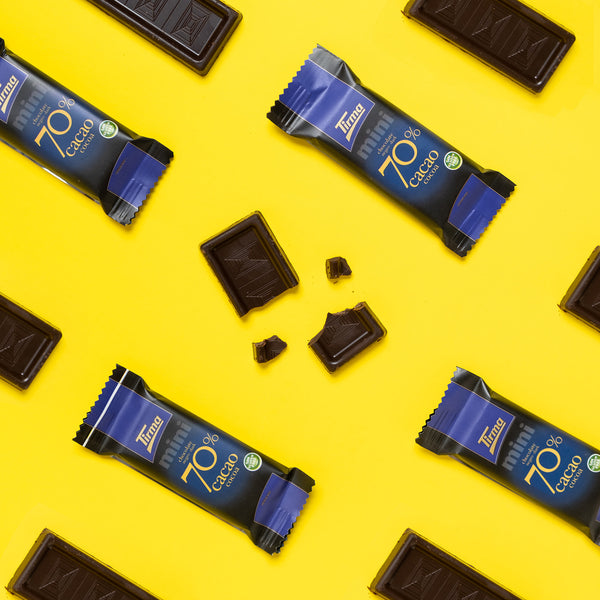 Tirma Mini Dark Chocolate Bars - 70% Chocolate against a yellow background. Spanish mini chocolate bar made in Spain.