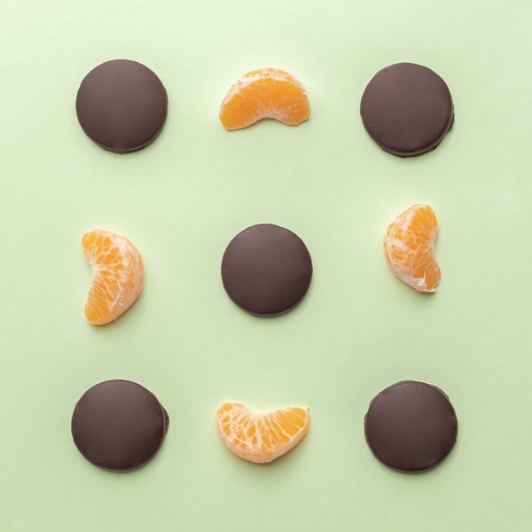 Tirma Orange Biscuits covered in 70% Dark Chocolate 200 g - 5 circle orange chocolate biscuits with 4 orange endocarp pulp. Spanish orange chocolate biscuits made in Spain.
