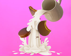 Cup pouring milk over cookies on a pink background