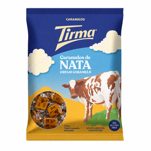 A bag of Tirma Caramelos de Nata (Cream Caramels) featuring a blue and yellow design with a cow illustration and a clear window showing the caramel pieces inside.