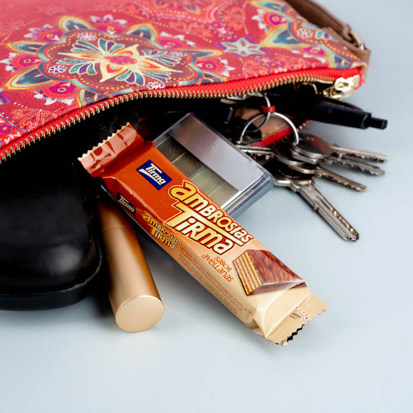 Your on the go snack that fits in your hand purse: Milk chocolate wafers filled with hazelnut cream convenient for travel