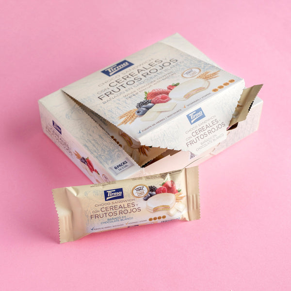 Tirma Cereal and Berry Chocolate Biscuit Sandwich Covered in White Chocolate 240 g in an open box in a pink background. Spanish cereal biscuits made in Spain.