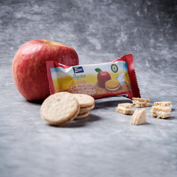 Tirma Digestive Apple Biscuit Filled with Yogurt Cream placed next to apple and round apple biscuits with 5 slice of biscuits filled with yogurt cream. Spanish apple biscuits made in Spain