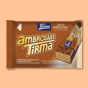 Tirma wafers filled with hazelnut cream dipped in milk chocolate against a peach colour background. Pack of 4, 86g
